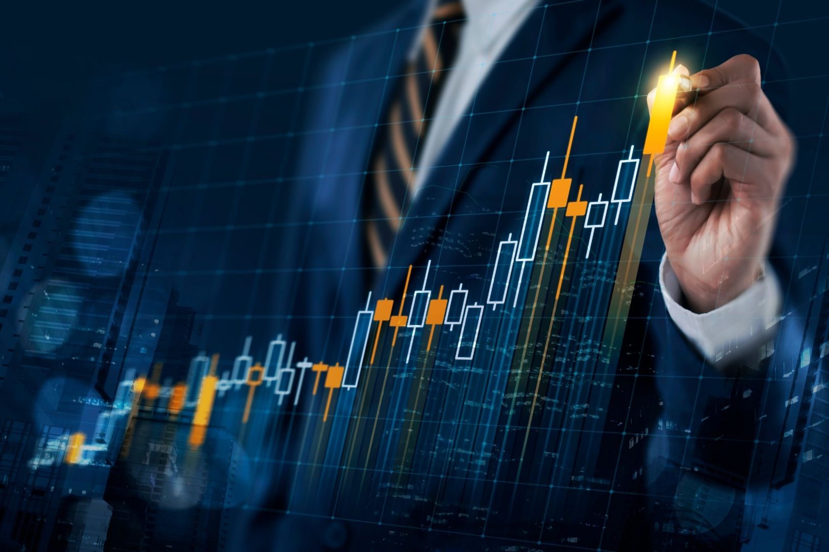 A man plotting a financial graph