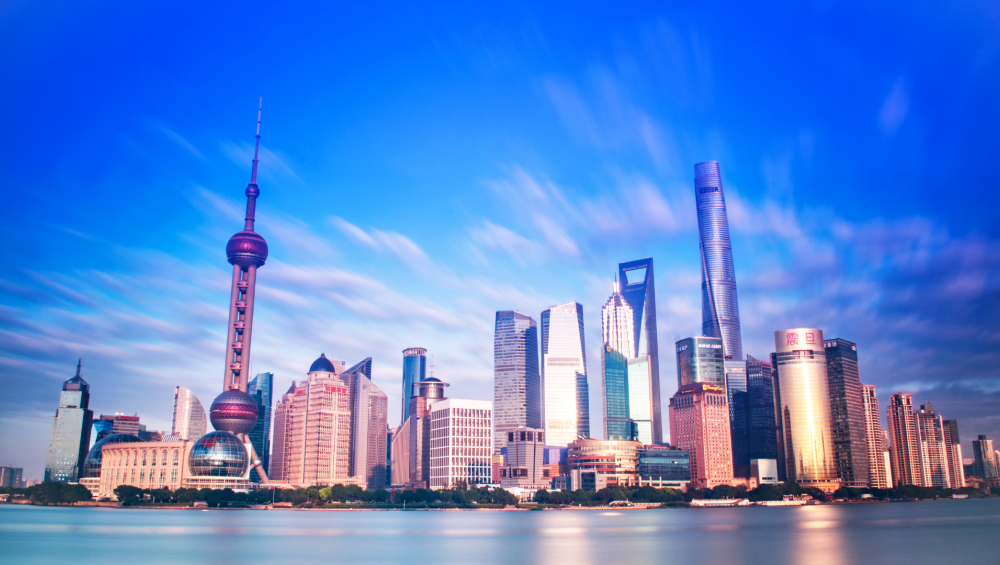 Shanghai skyline featuring the Oriental Pearl Tower and modern cityscape