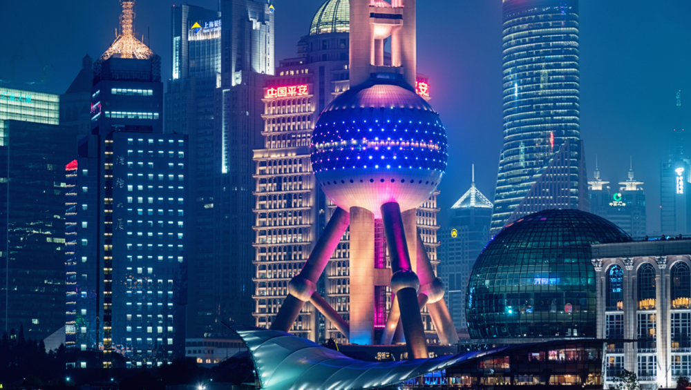 Night view of the Oriental Pearl Tower and skyscrapers in Shanghai, China.