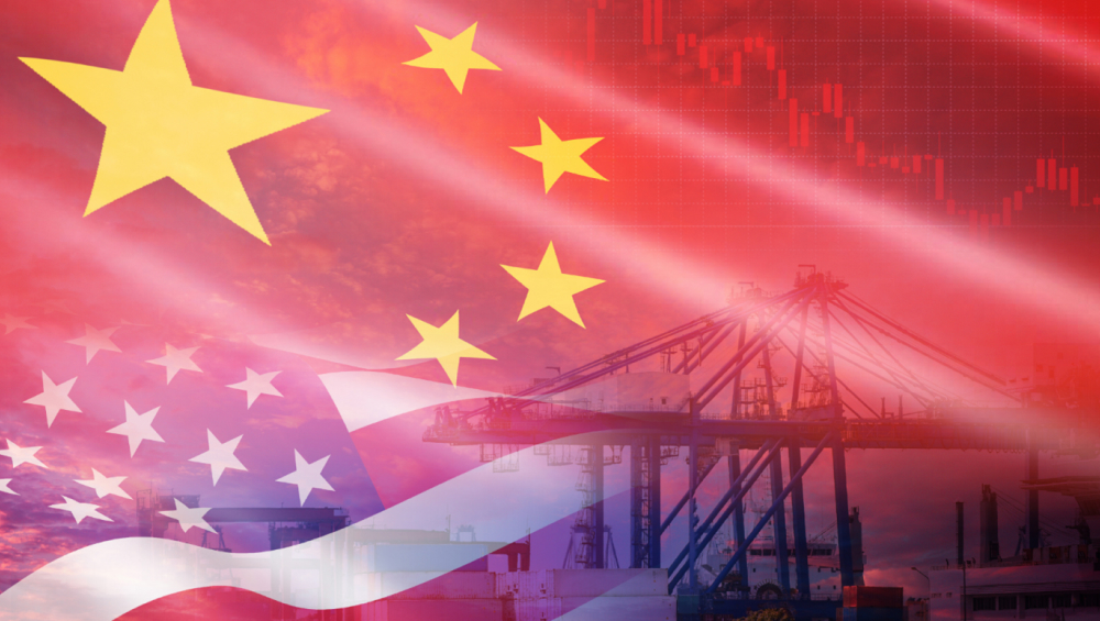 Overlaid flags of the USA and China blended with a shipping port and a falling red stock chart.