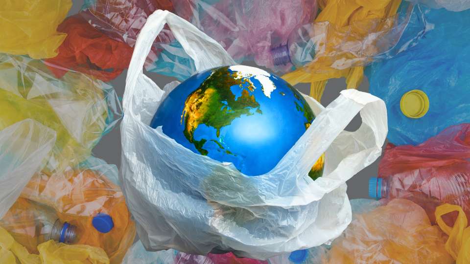 A globe representing Earth being held inside a single, white plastic shopping bag, surrounded by crumpled plastic waste.