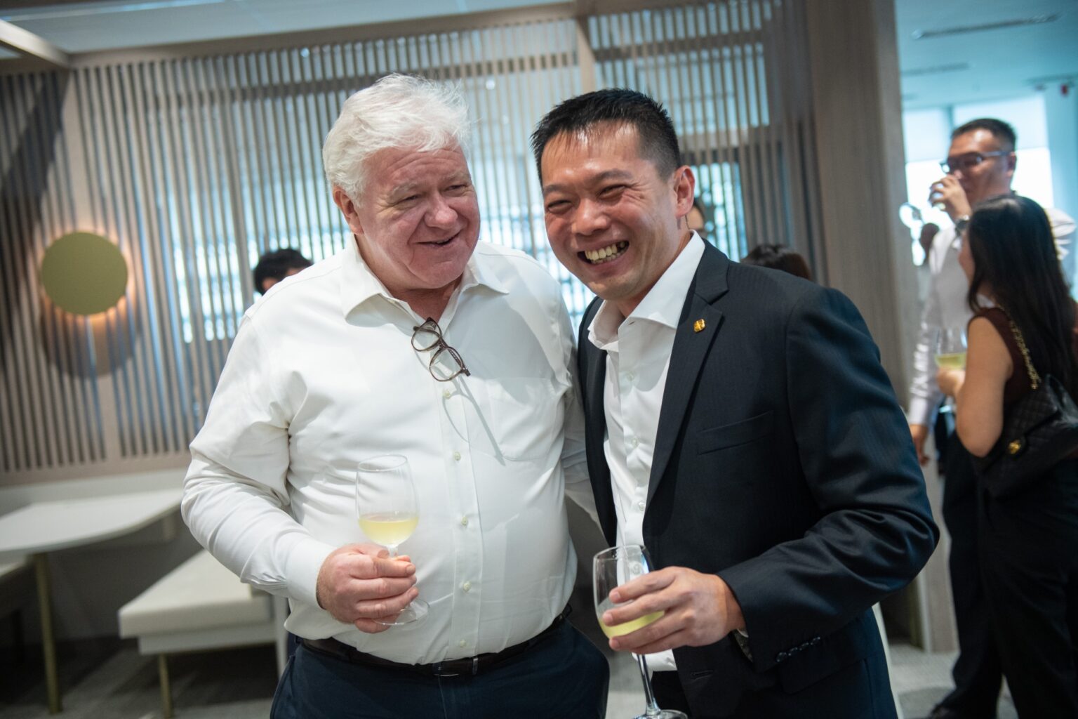 CEO, Marcus Goi, posing with guests at Orient Futures Singapore’s grand opening celebration