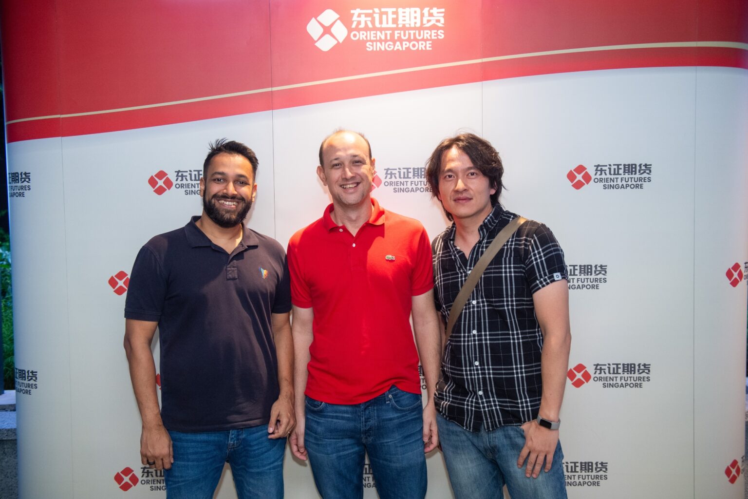 Guests posing at Orient Futures Singapore’s office grand opening event