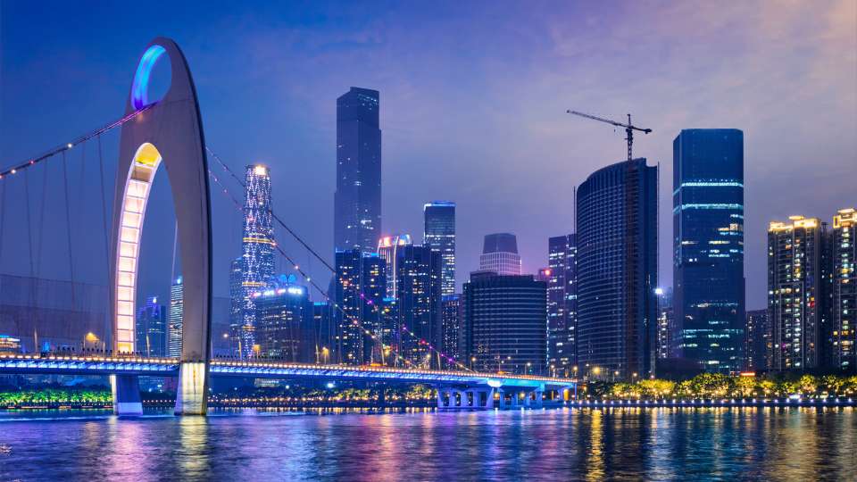 Guangzhou Skyline And Liede Bridge In Evening