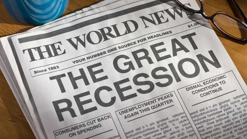 Newspaper headline reading "THE GREAT RECESSION" with smaller articles about unemployment and economic conditions.