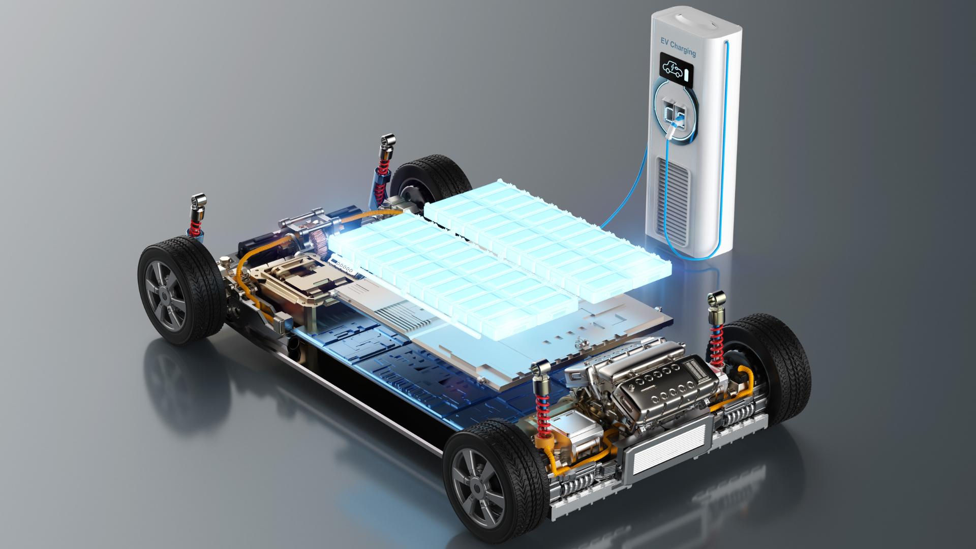 Electric vehicle chassis showing battery pack and charging station.