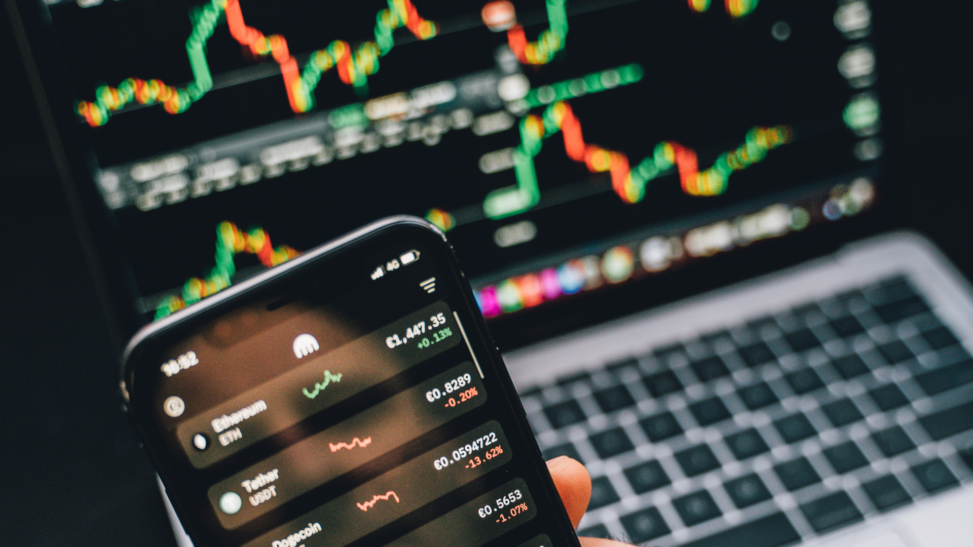 A person viewing price of coins on a mobile phone