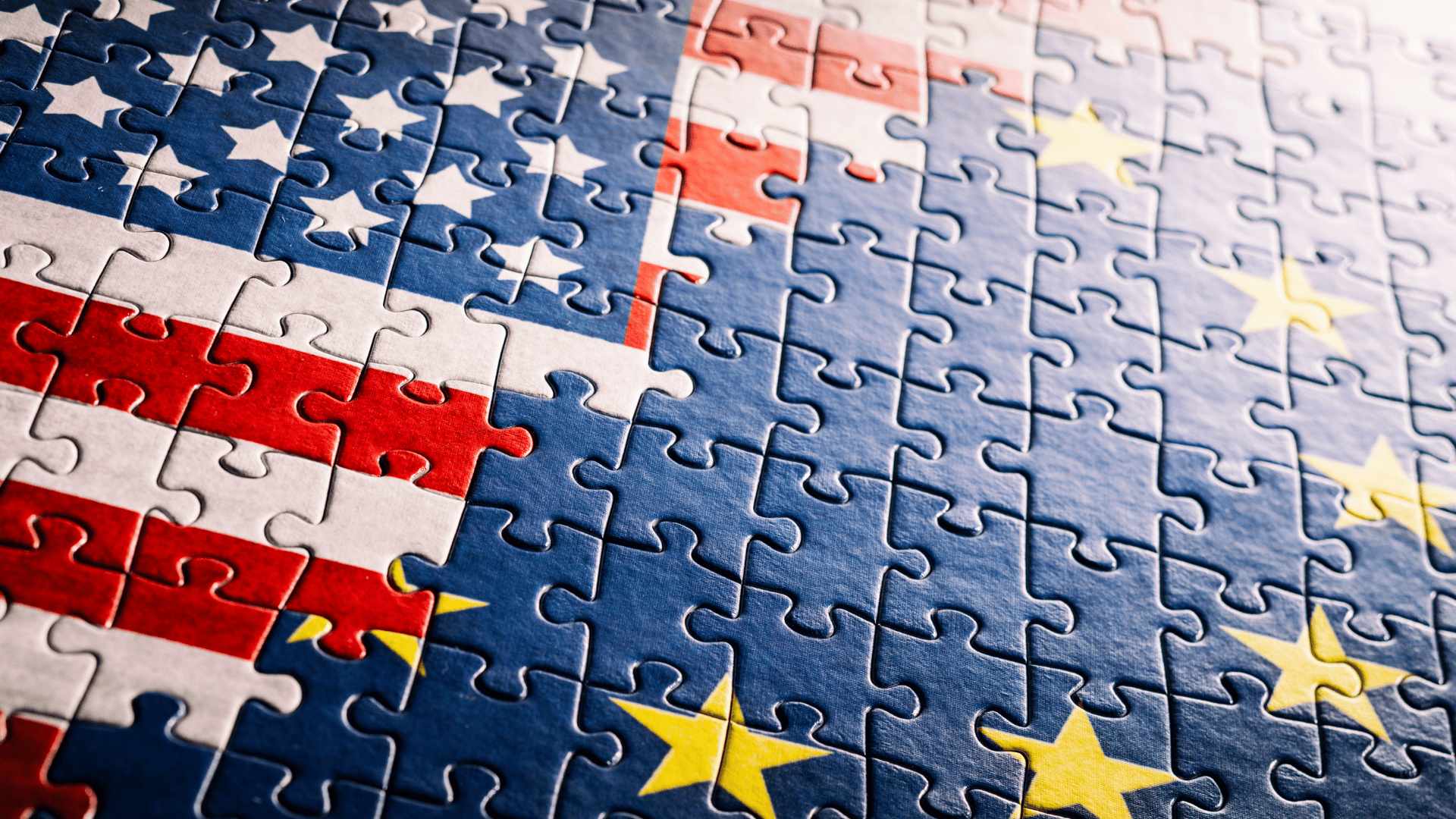 Jigsaw puzzle combining the American flag and the European Union flag.