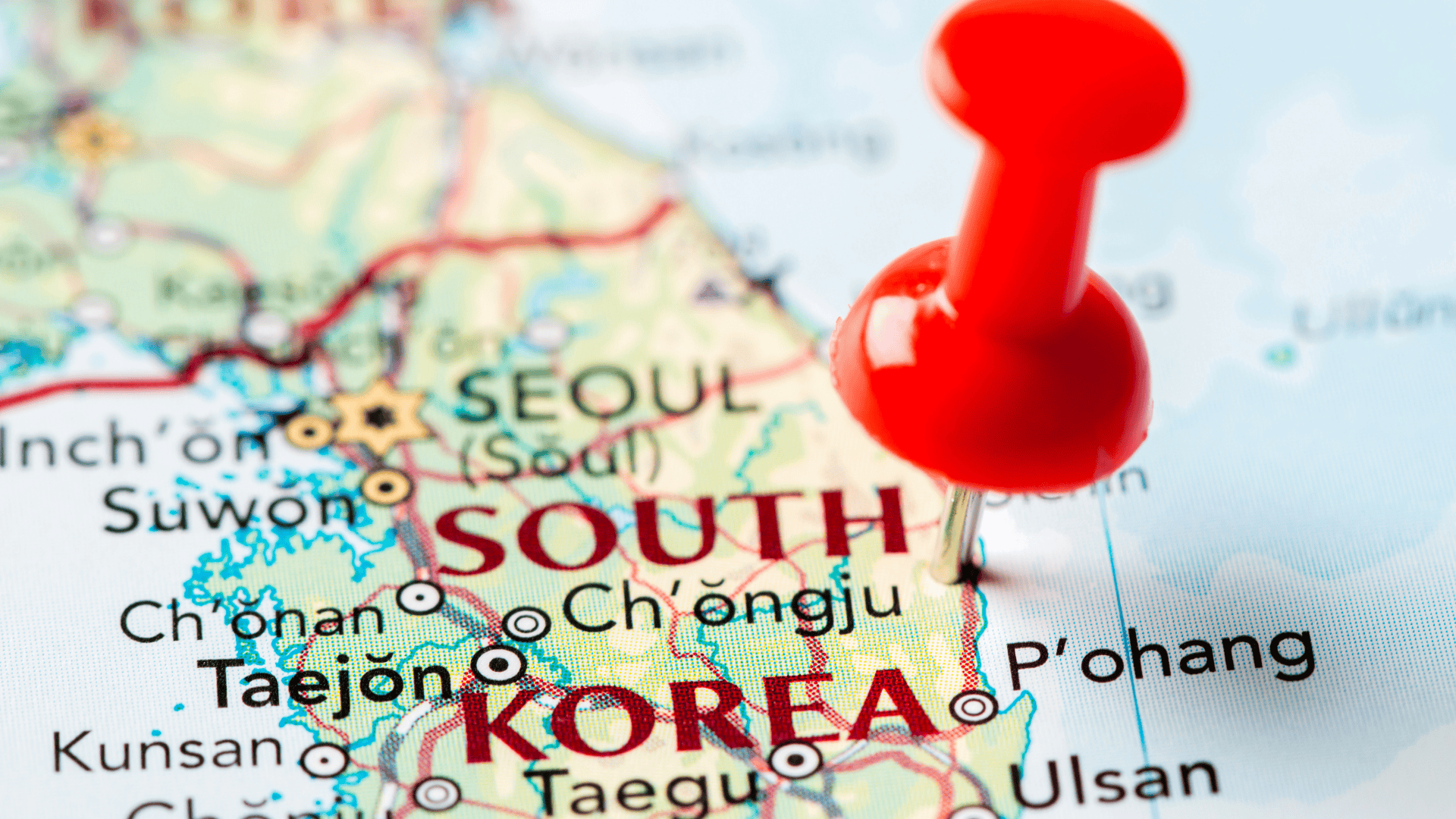 Close-up of a map of South Korea showing Seoul and nearby cities, with a red pushpin marking a location.