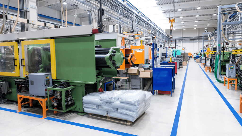 Modern plastic injection molding factory with automated machinery and clean production lines.