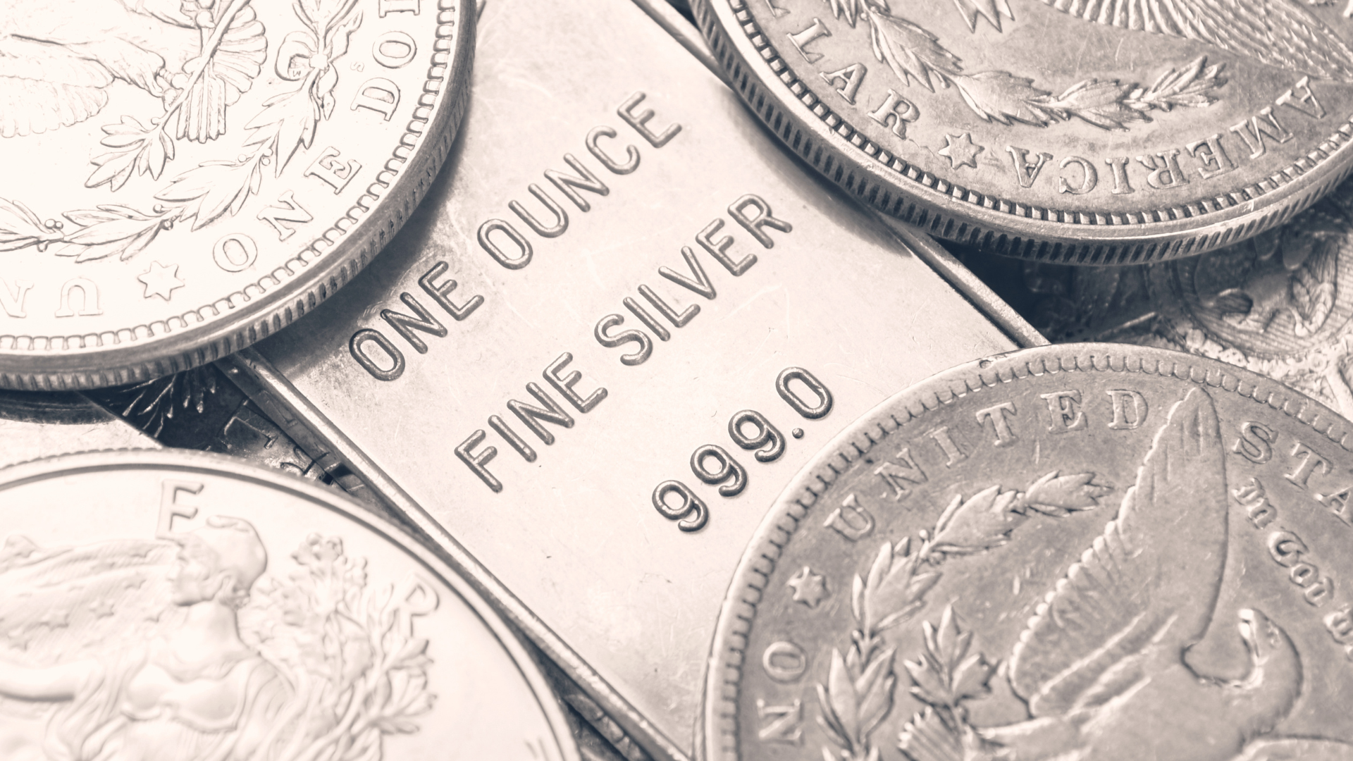 Silver bars and coins featured in Orient Futures Singapore's Morning Brief