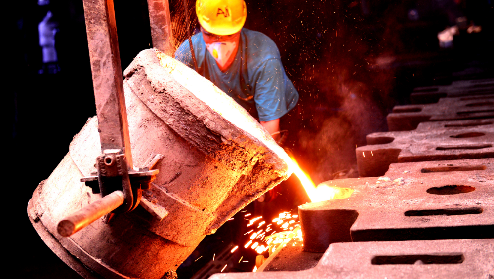 Man Pouring Hot Liquid Metal