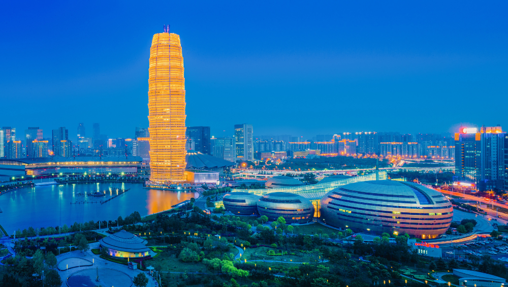 Zhengzhou’s iconic Big Corn Building (Greenland Center Millennium Royal Plaza) and Henan Arts Center light up the city skyline at night
