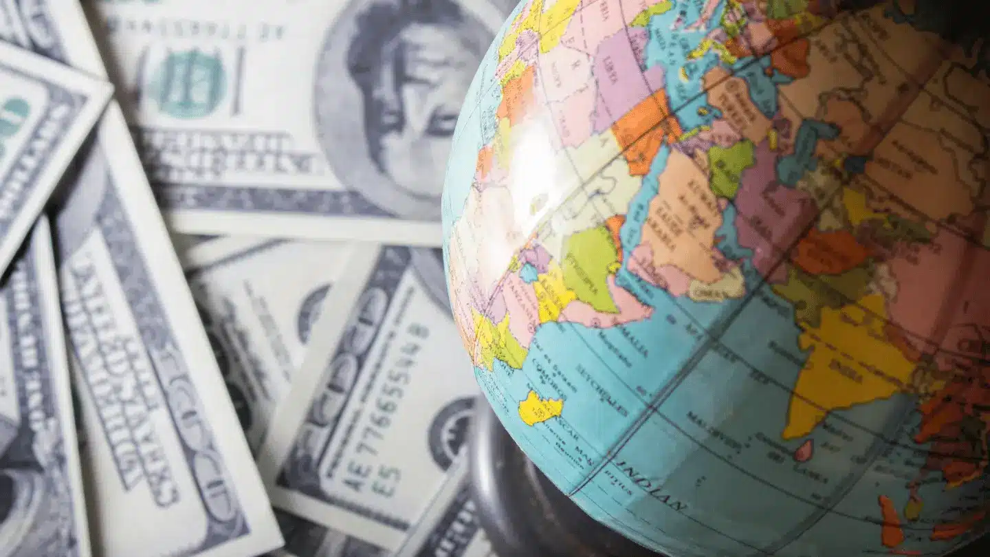 World currency, money and globe
