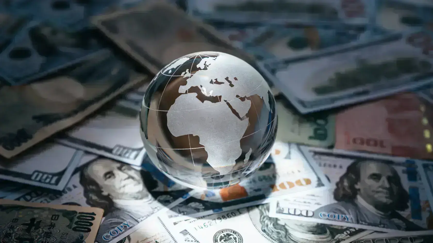 Crystal globe on many currency